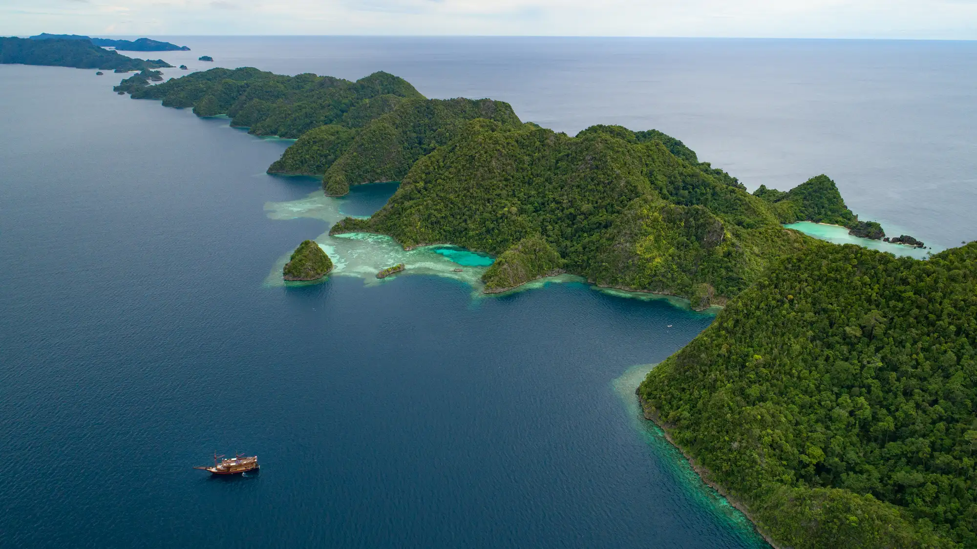 Lotus Malaillo liveaboard sails from Misool, Raja Ampat